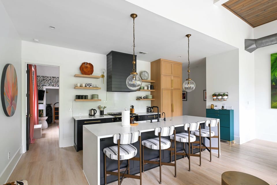 An open kitchen and dining area perfect for slow mornings and group dinners.