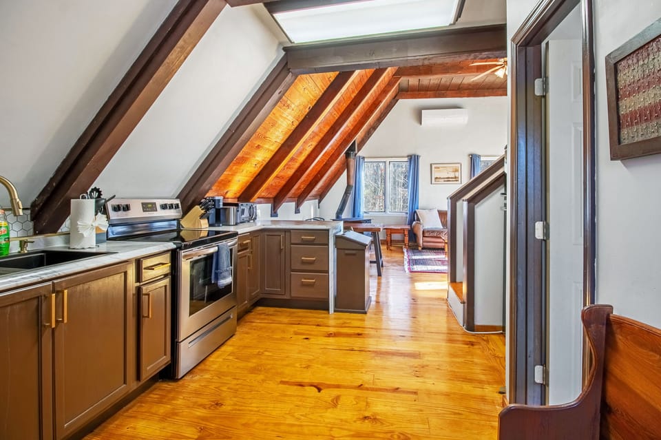 Full kitchen includes stove top, oven, refrigerator, microwave, Keurig, and more!