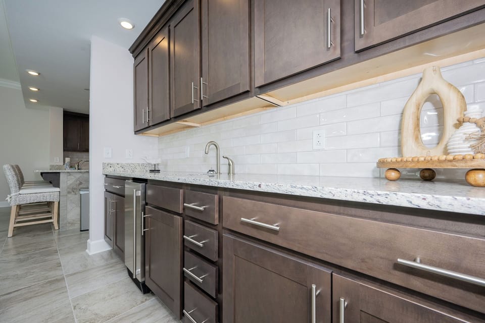Grab a chilled drink from the fridge or create your favorite cocktail at the wet bar