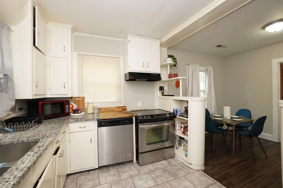 The full kitchen is equipped with all the basic appliances you need, making it easy to prepare meals and enjoy the comforts of home during your stay.