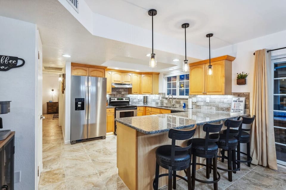 Beautiful kitchen with island that seats 4.