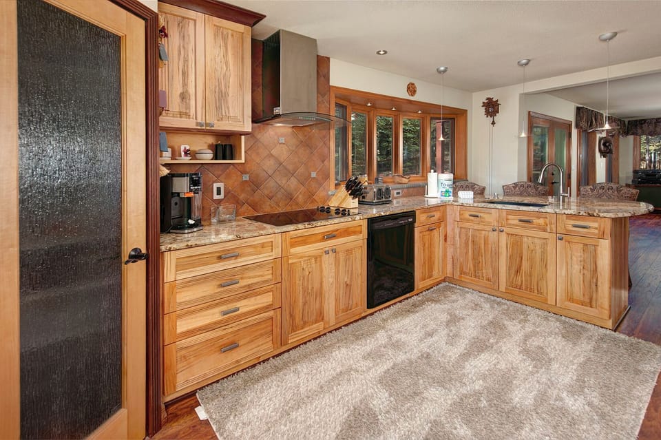 Full gourmet, chef's kitchen with stainless steel appliances.