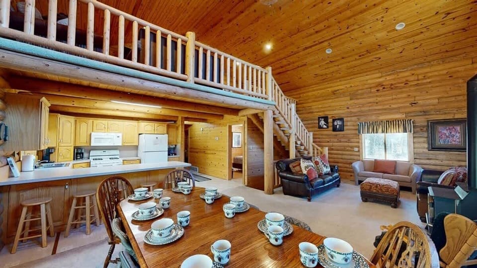 Large open view of dining area, kitchen, and living room.