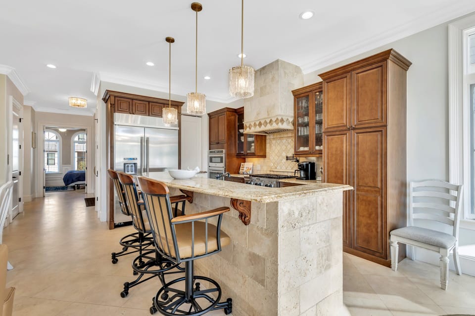 Seamlessly connected with kitchen and dining areas it is designed for socializing in style.