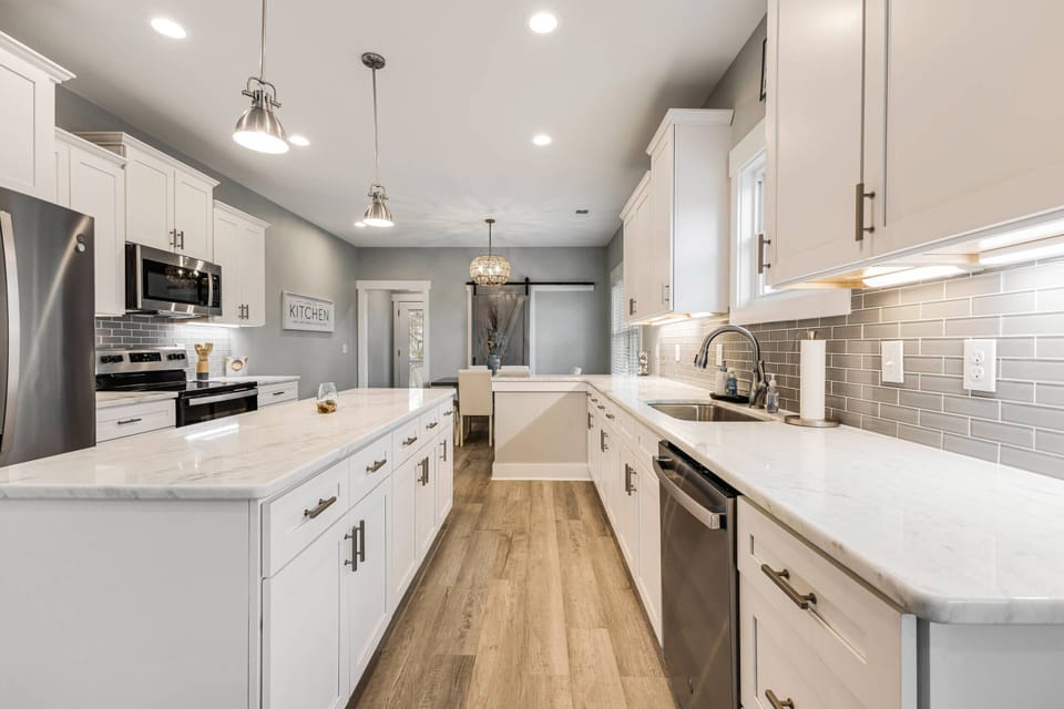 The kitchen features very spacious counters and comes fully equipped with all the necessary appliances!