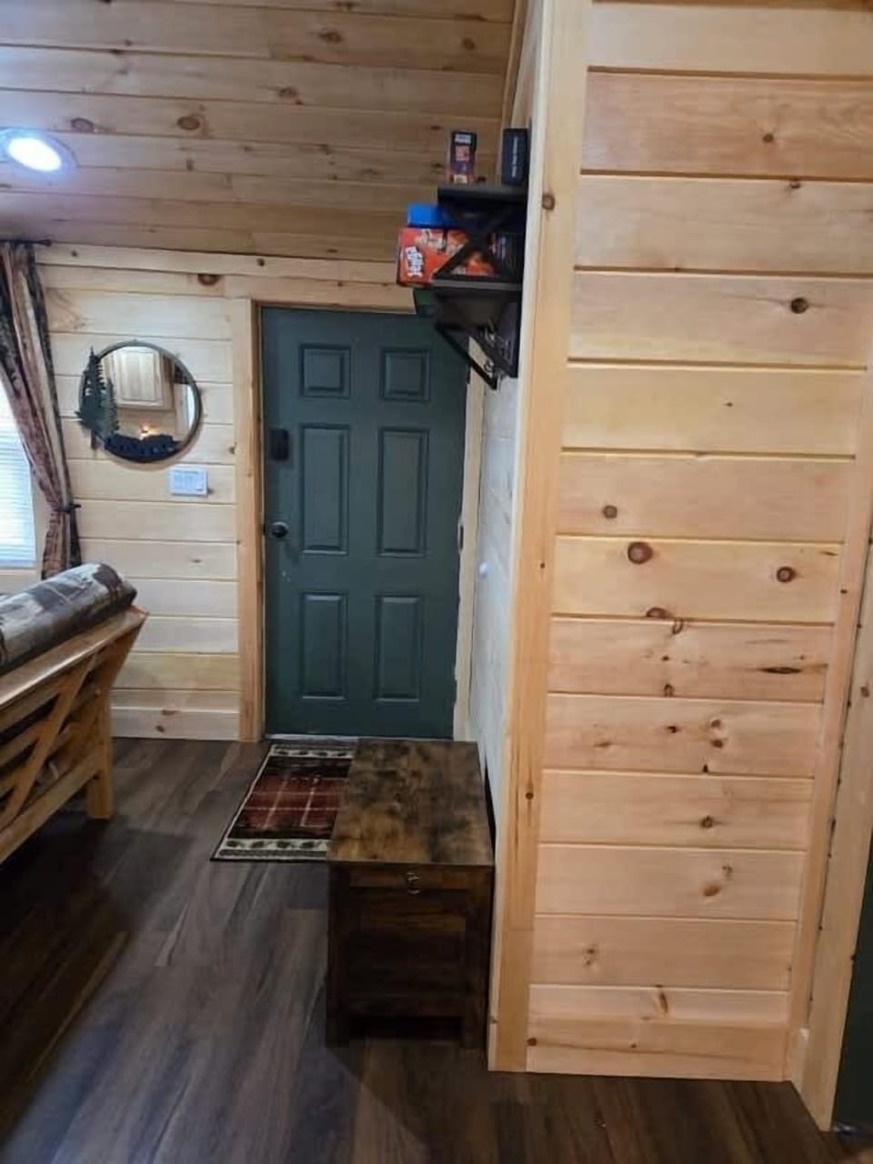 Entryway Delight: Welcome to your charming escape with rustic wood accents and a warm vibe!
