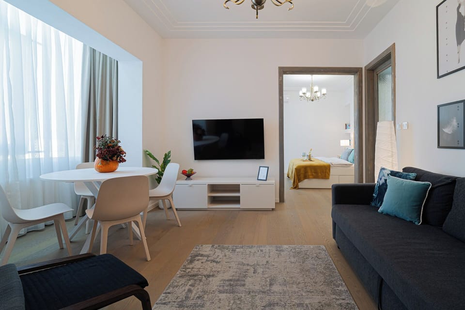 Comfort Apartment, 2 Bedrooms, Balcony, City View | Living area | 42-inch Smart TV with cable channels, Netflix, streaming services