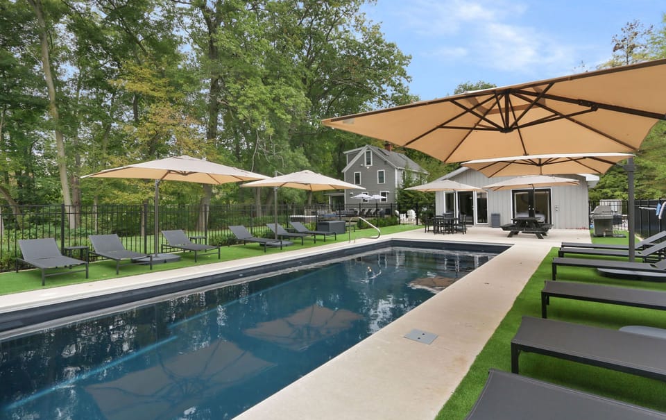 Pool, umbrellas and loungers