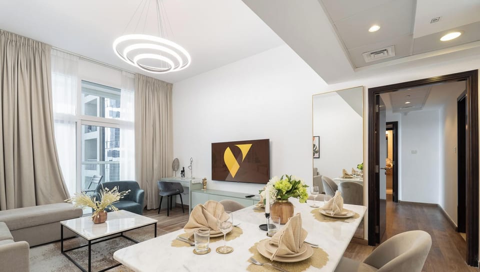 Standard Apartment, City View | Living room | 65-inch Smart TV with cable channels