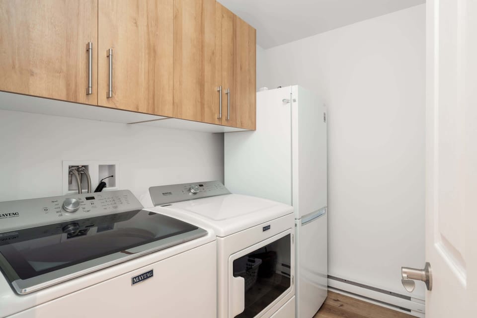 Practical laundry room with washer and dryer