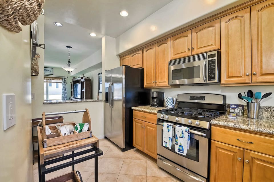 The open, airy kitchen offers ample space & every home comfort