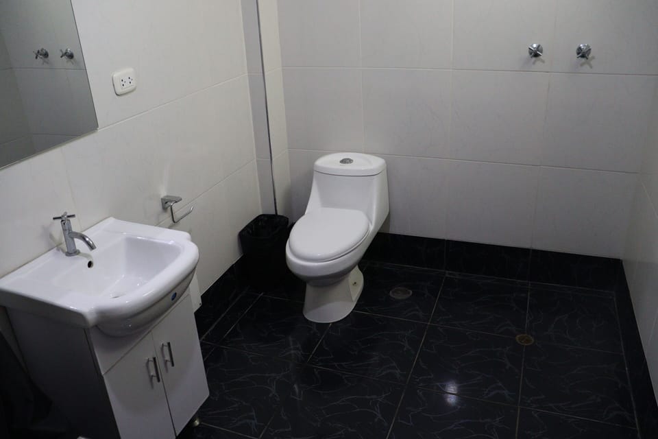 Separate tub and shower, rainfall showerhead, towels, soap
