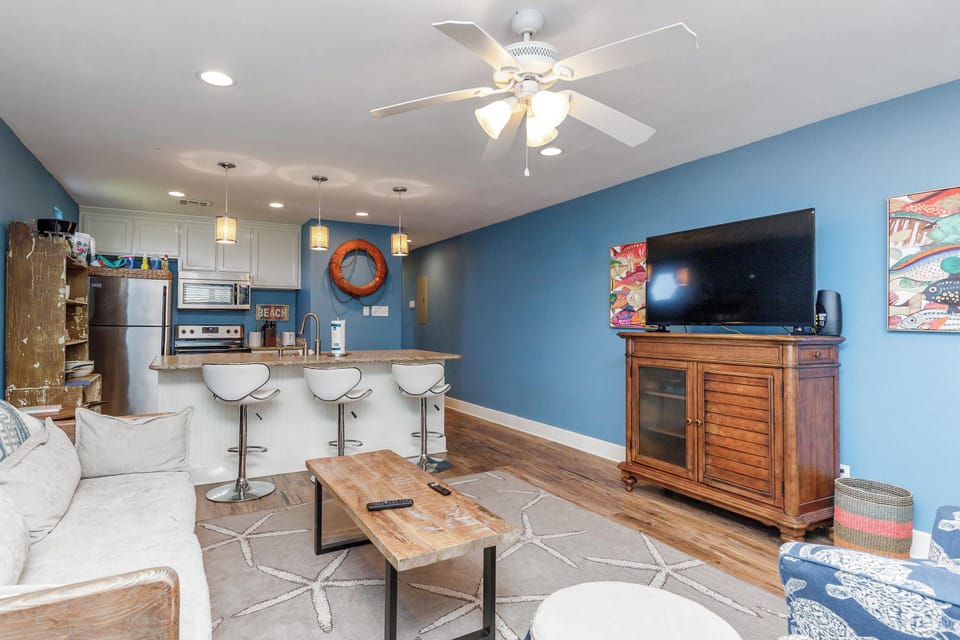 Living, dining, and kitchen area