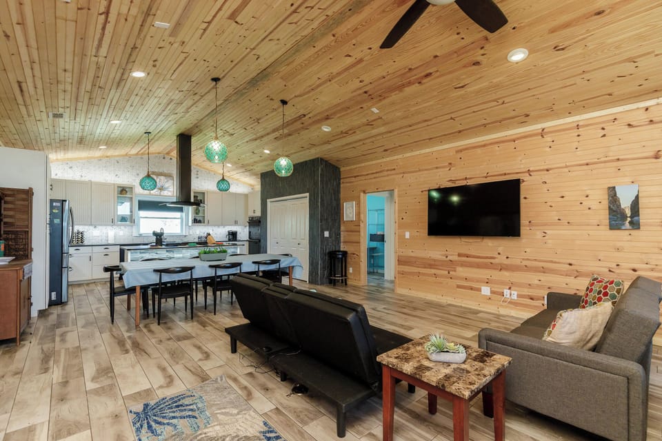 Cozy and spacious living area with TV