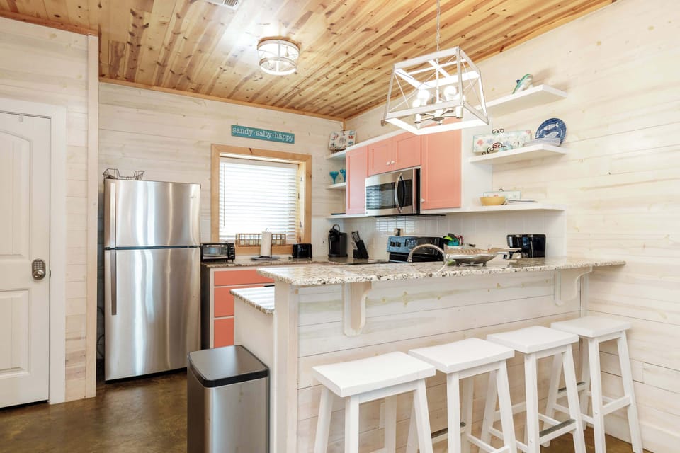Sip morning coffee or enjoy a snack at the counter, with stool seating for 4