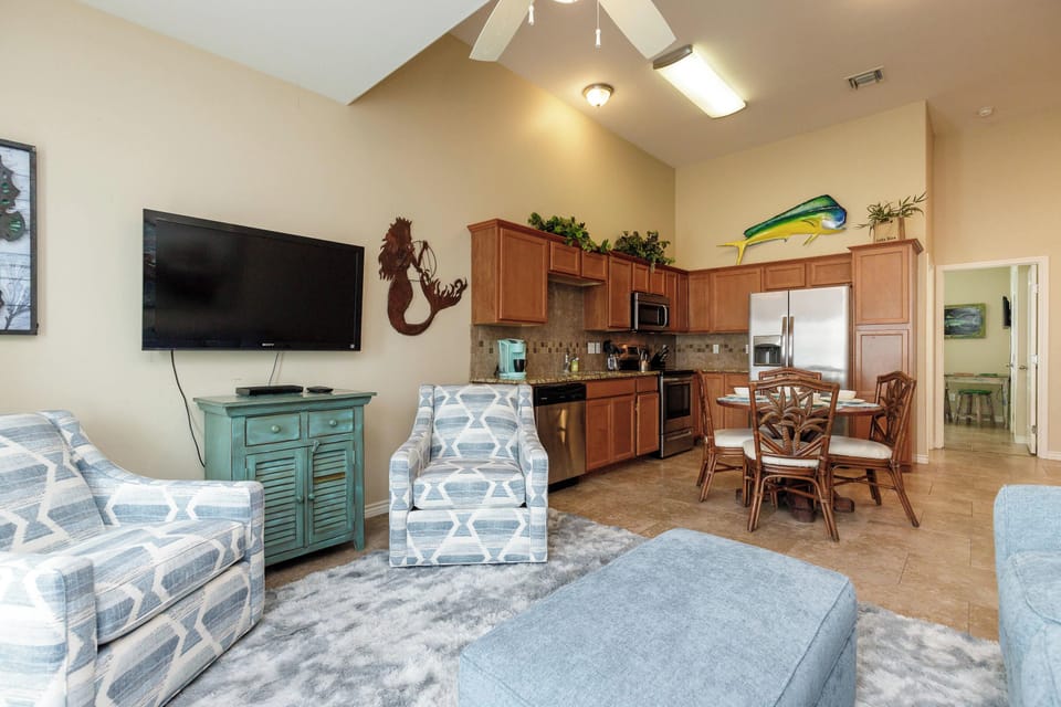 Open living, dining, and kitchen space
