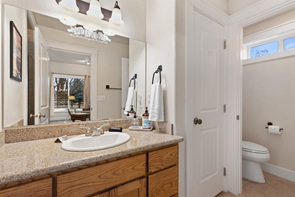 Bathroom with a separate private toilet room