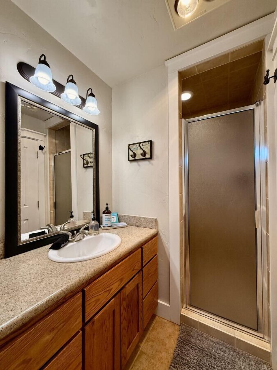 Spacious bathroom with a custom tile walk-in shower