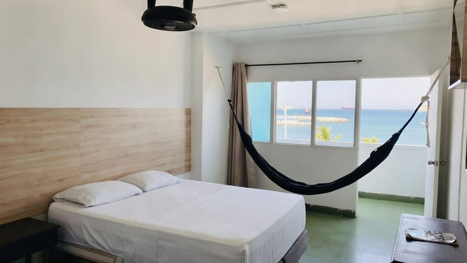 Standard Double Room, 1 Double Bed, Balcony, Sea View (#406) | WiFi (free), bed sheets