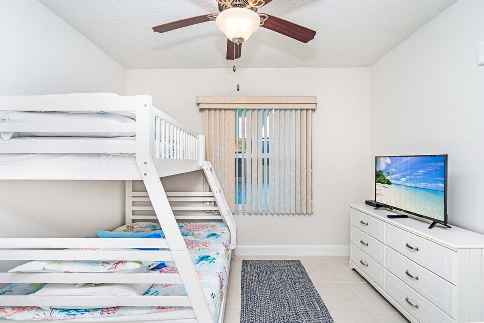 Twin/Full Bunk Bed with TV