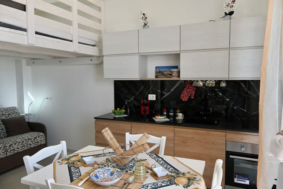 Family Room, Sea View, Ground Floor | Private kitchen | Coffee grinder