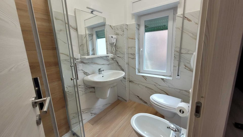 Standard Double or Twin Room | Bathroom | Shower, rainfall showerhead, hair dryer, bidet