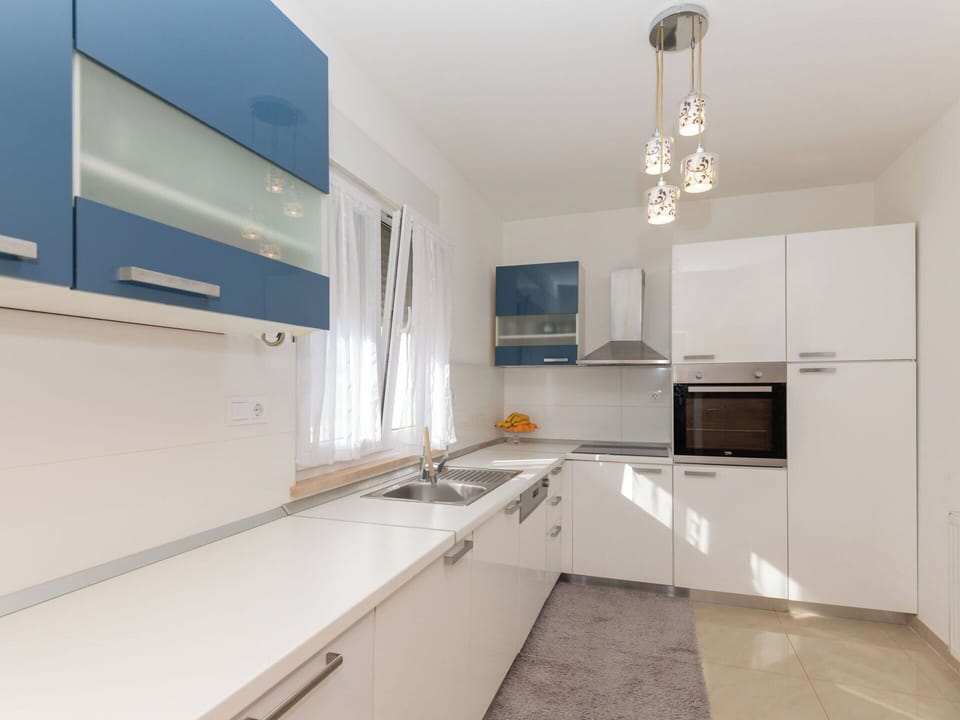 Kitchen, Interior Design, Flooring, Countertop, Cabinetry, Wood, Floor, Ceiling, Kitchen Appliance, Furniture