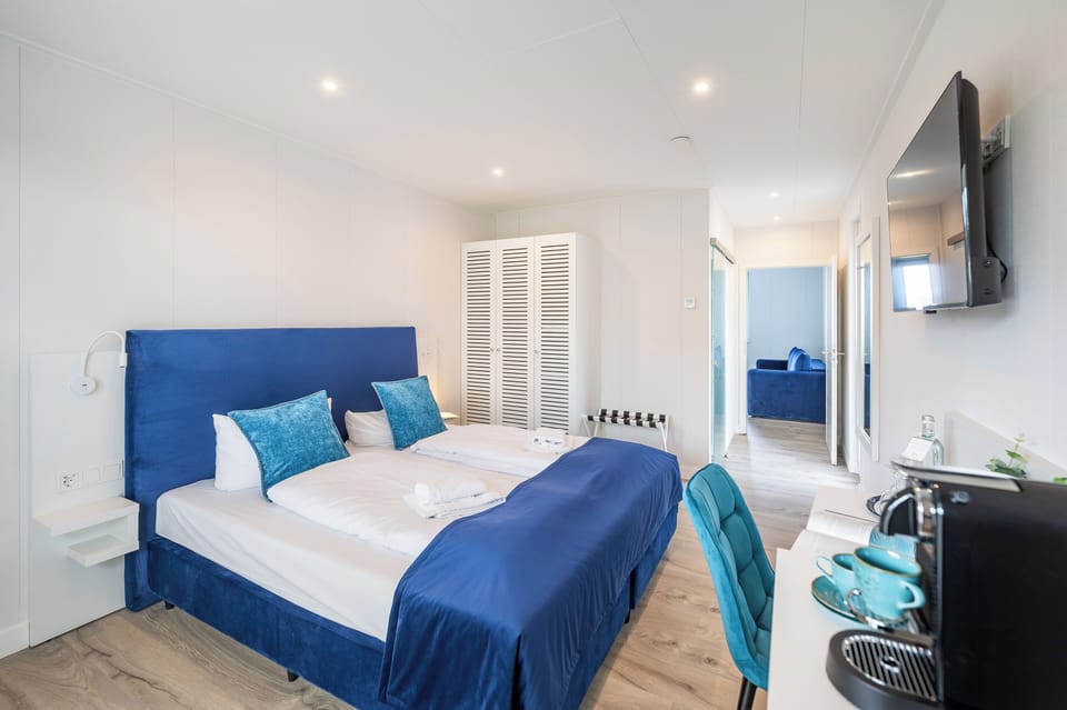 Family Twin Room, Balcony, Partial Sea View | Desk, soundproofing, free WiFi