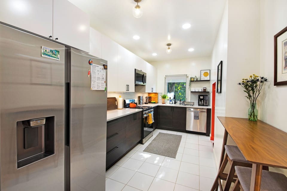 Fully stocked kitchen, plenty of light, under cabinet lighting & coffee station