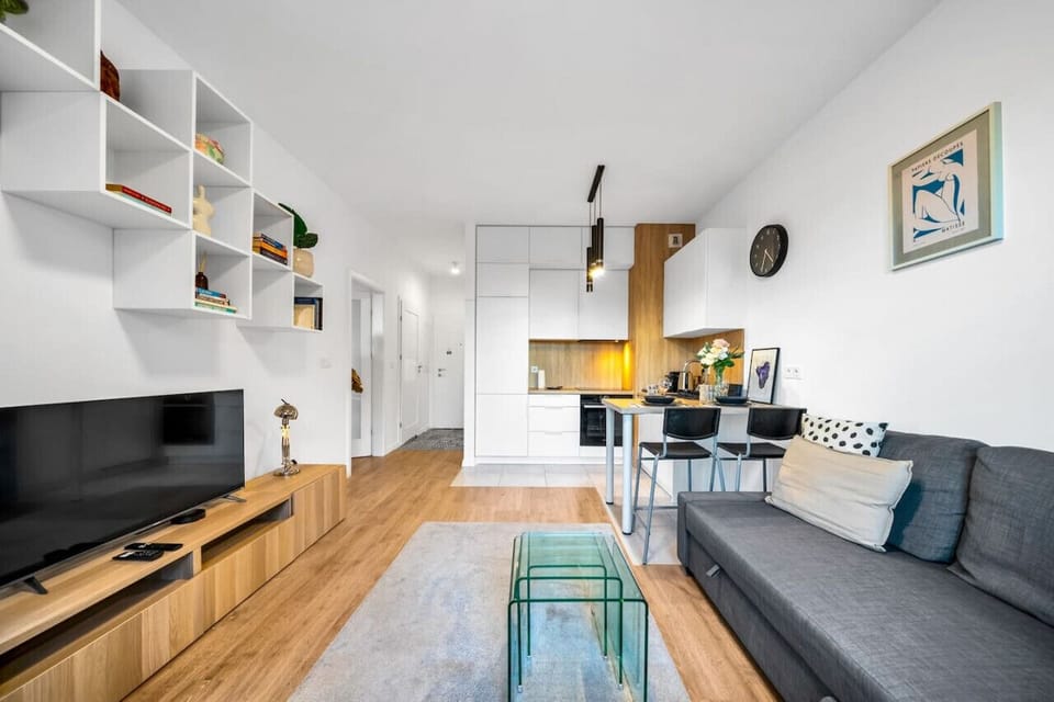 Smart TV and Sofa | Book Now with RENTUJEMY.COM