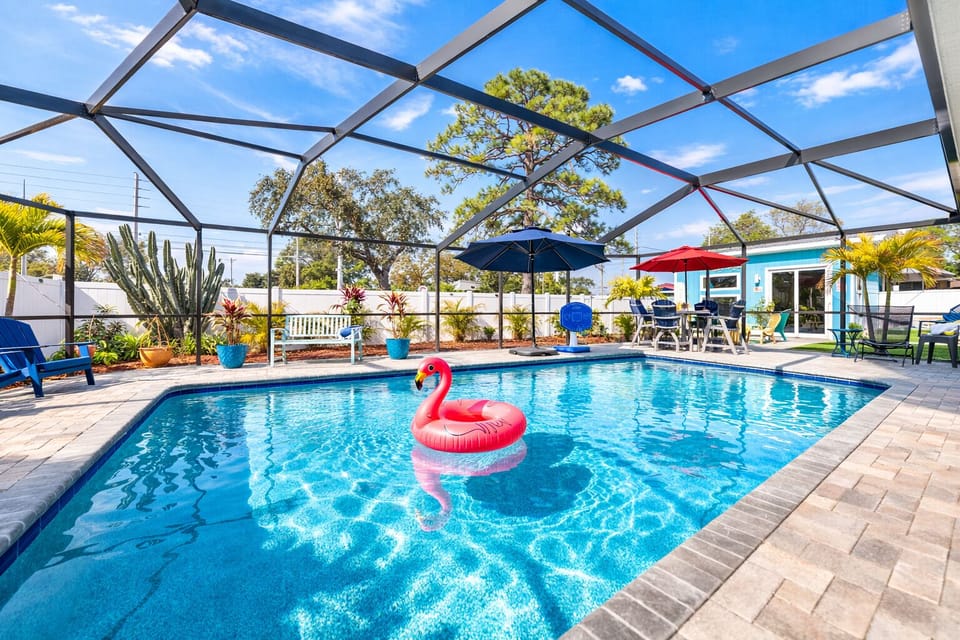 Beautiful lanai-covered pool offering shade, sunshine, and total relaxation.
