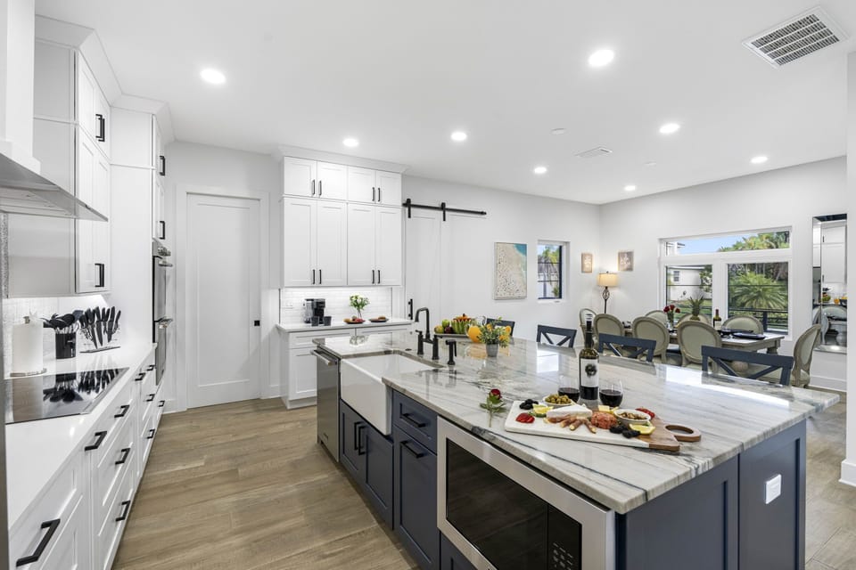 Spacious countertops, ample cabinetry, and modern gadgets ensure that meal prep is a breeze, whether you're whipping up a gourmet meal or simply reheating leftovers.