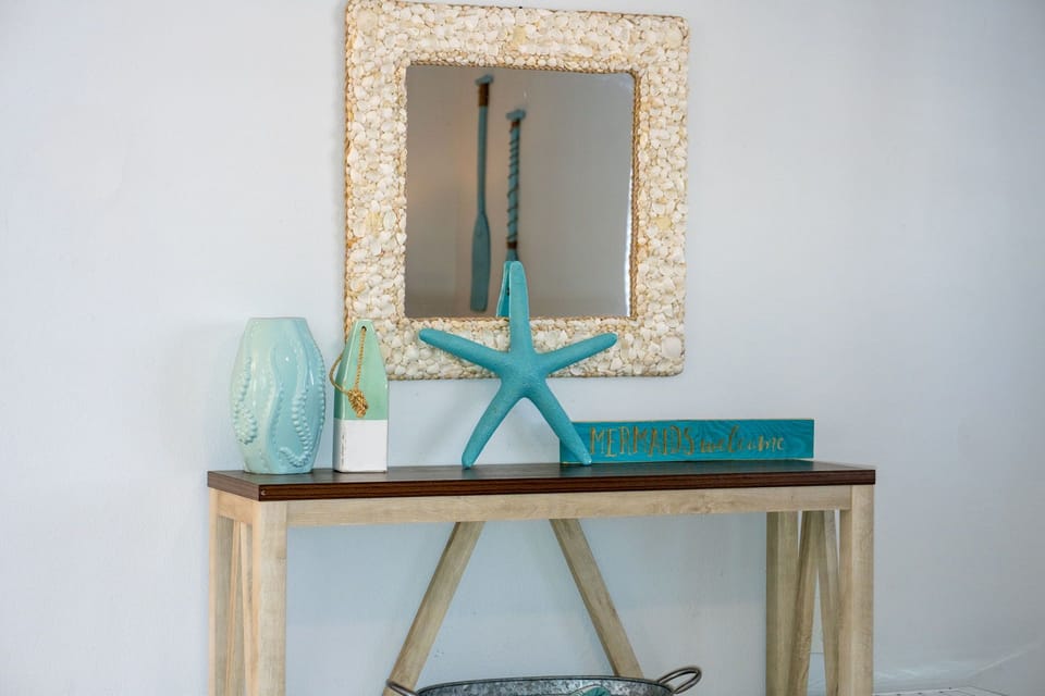 Designed with a soothing, beach-inspired ambiance, this room is perfect for unwinding after a sun-filled day.