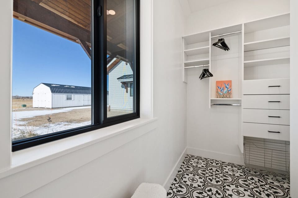 Primary En-Suite Walk In Closet