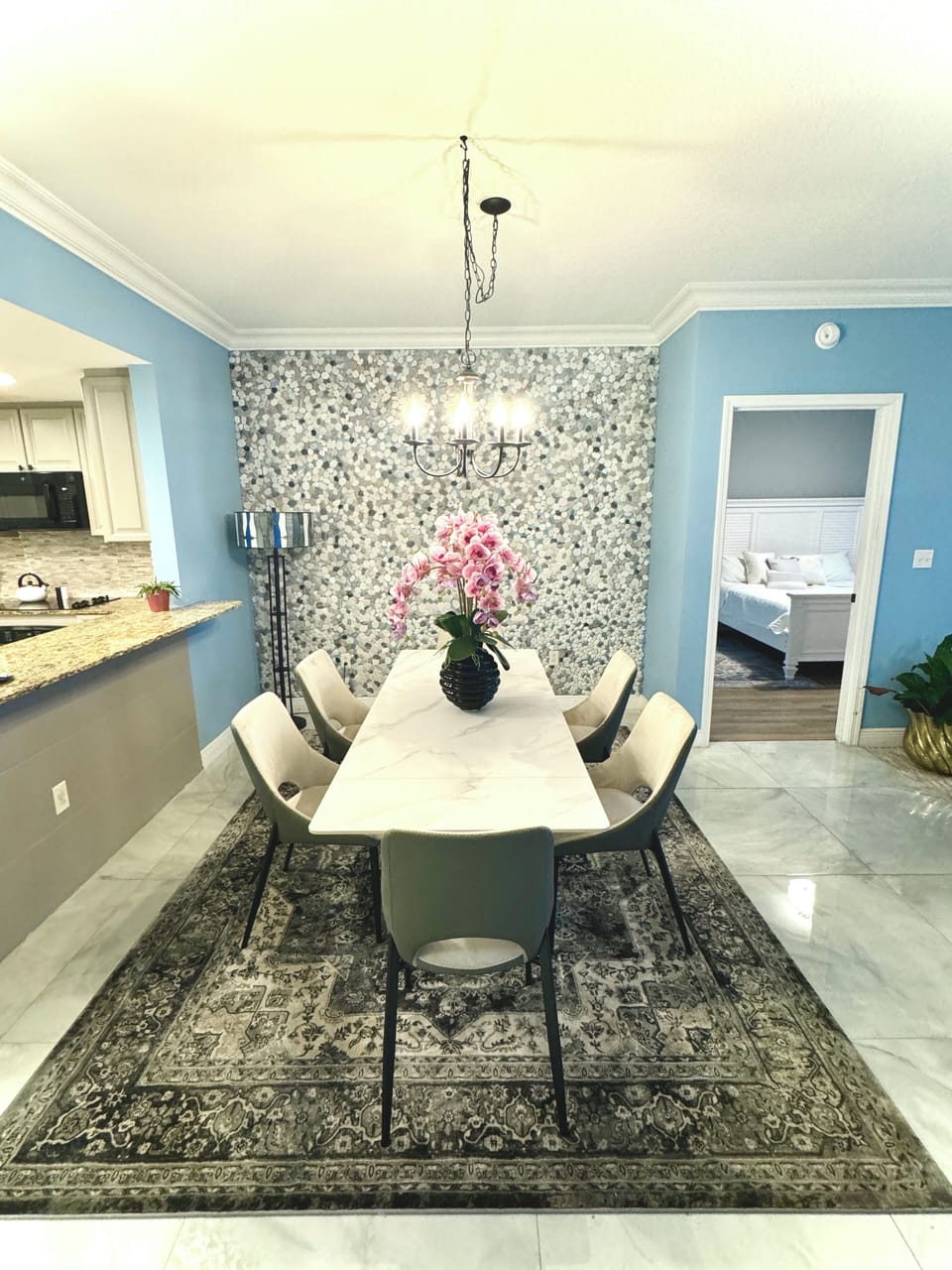 Spacious 6 family table. Comfortable and close to the open kitchen.