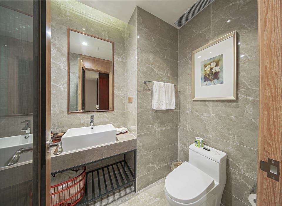 Basic Double Room | Bathroom | Shower, hair dryer, bathrobes, slippers