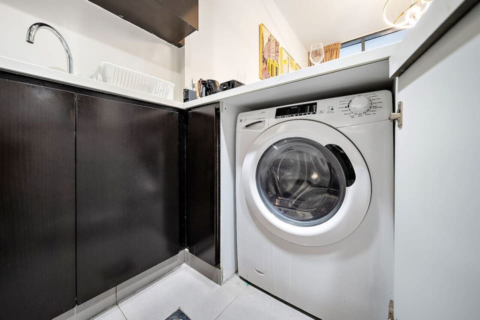 Laundry Room: Enjoy the convenience of in-unit laundry for stress-free travel!