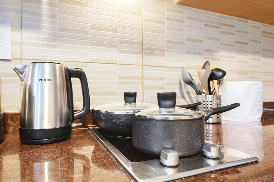 Kitchen Delight: Whip up culinary masterpieces with modern appliances and sleek decor!