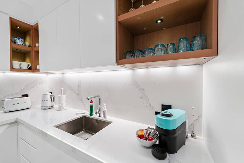Kitchen Delight: Sleek countertops, modern appliances, and stylish storage await your culinary adventures!