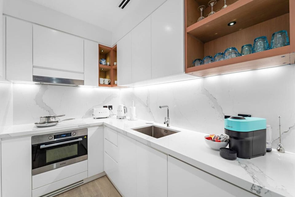 Kitchen: Sleek design meets functionality—prepare meals with style in this modern culinary haven!