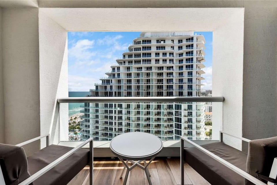 Modern balcony with scenic view.