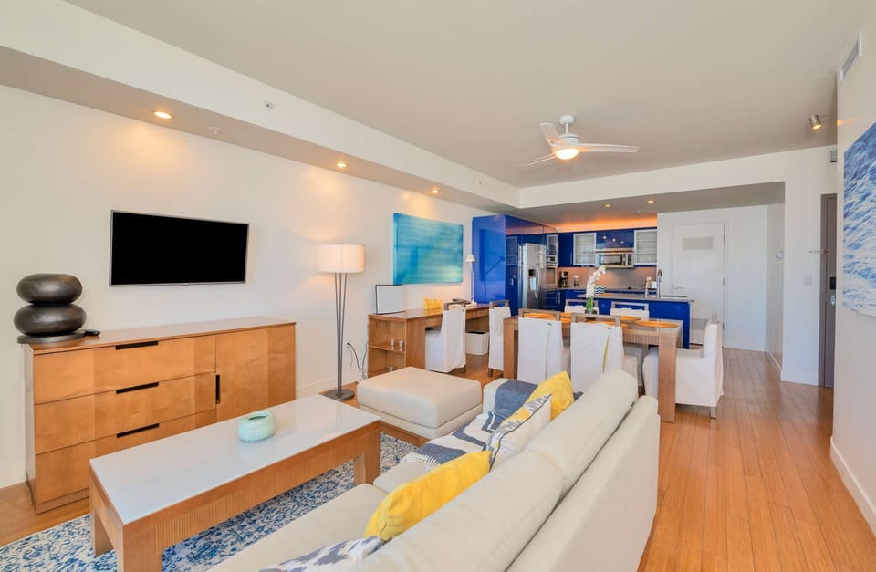 Living room with TV and spacious sofa