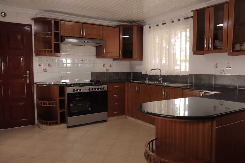 Deluxe Villa, Garden View | Private kitchen | Fridge, microwave, oven, cookware/dishes/utensils