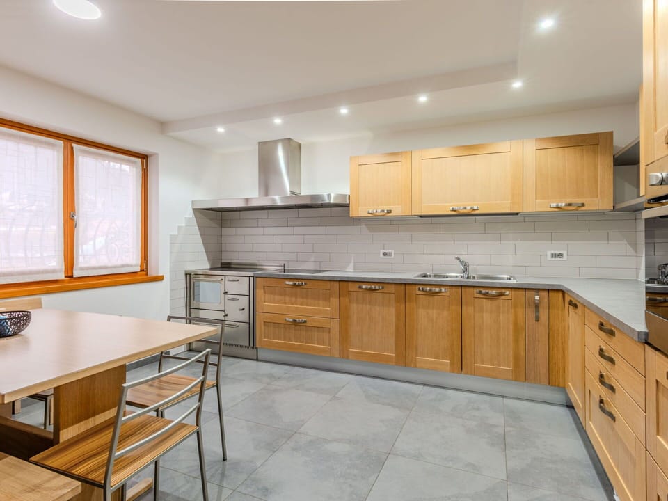 Kitchen, Countertop, Cabinetry, Furniture, Flooring, Kitchen Appliance, Interior Design, Wood, Major Appliance, Floor