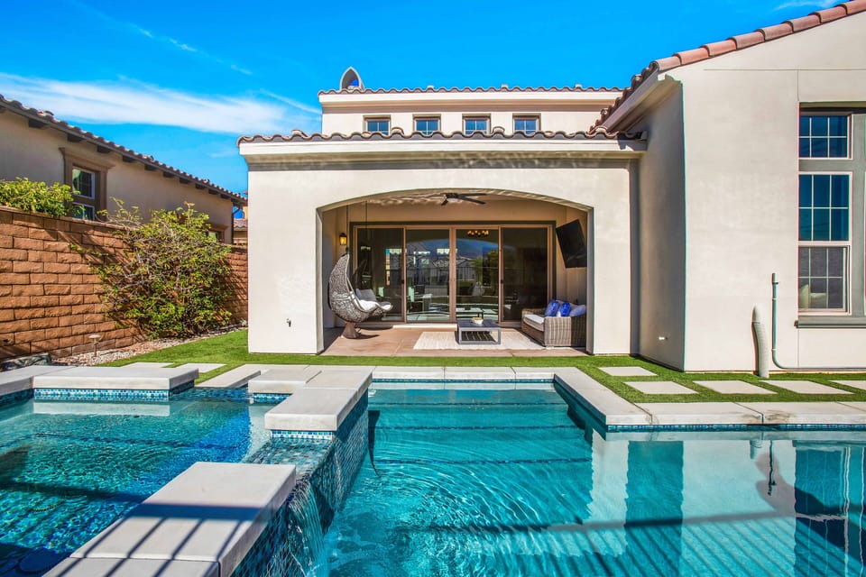 Covered patio and poolside lounge with seamless indoor-outdoor flow