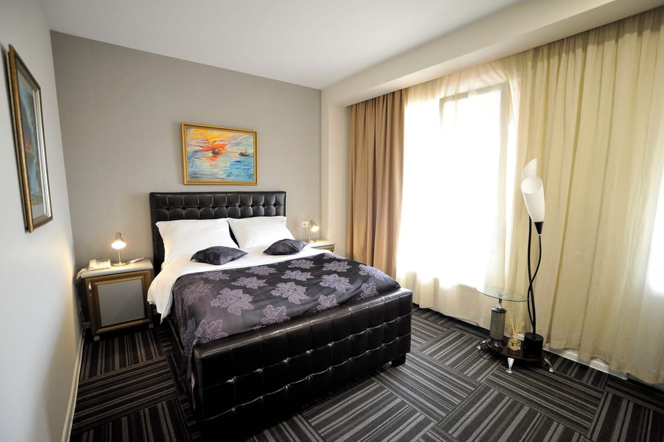 Standard Double Room, City View | In-room safe, desk, soundproofing, iron/ironing board