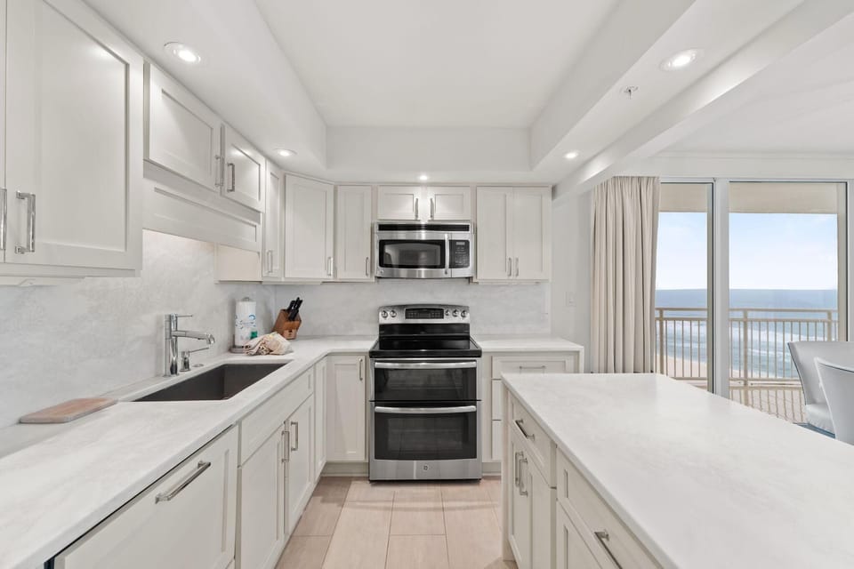 Condo, Multiple Beds (SeaSpray West 801- Gulf Front) | Private kitchen | Oven, toaster, paper towels