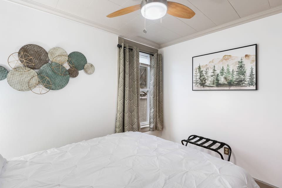 Restful bedroom designed for comfort.
