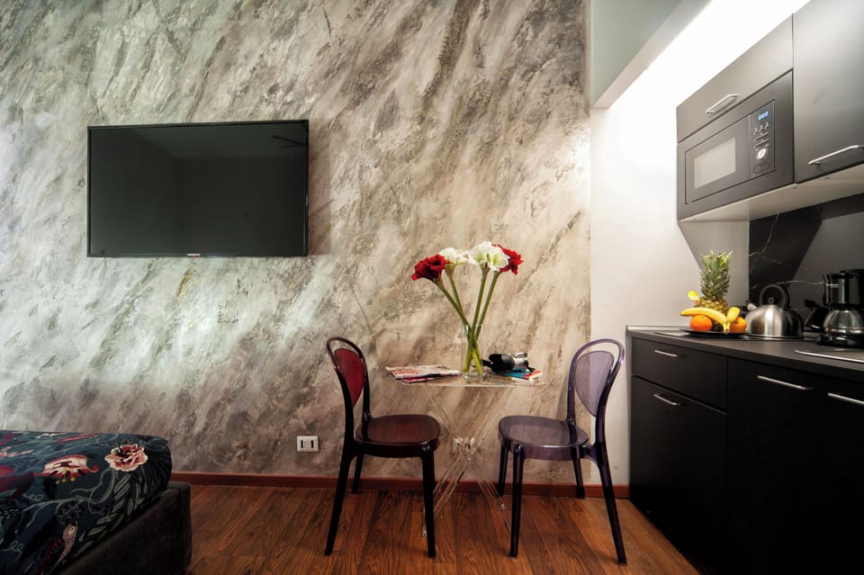 Comfort Apartment | Minibar, in-room safe, iron/ironing board, free WiFi