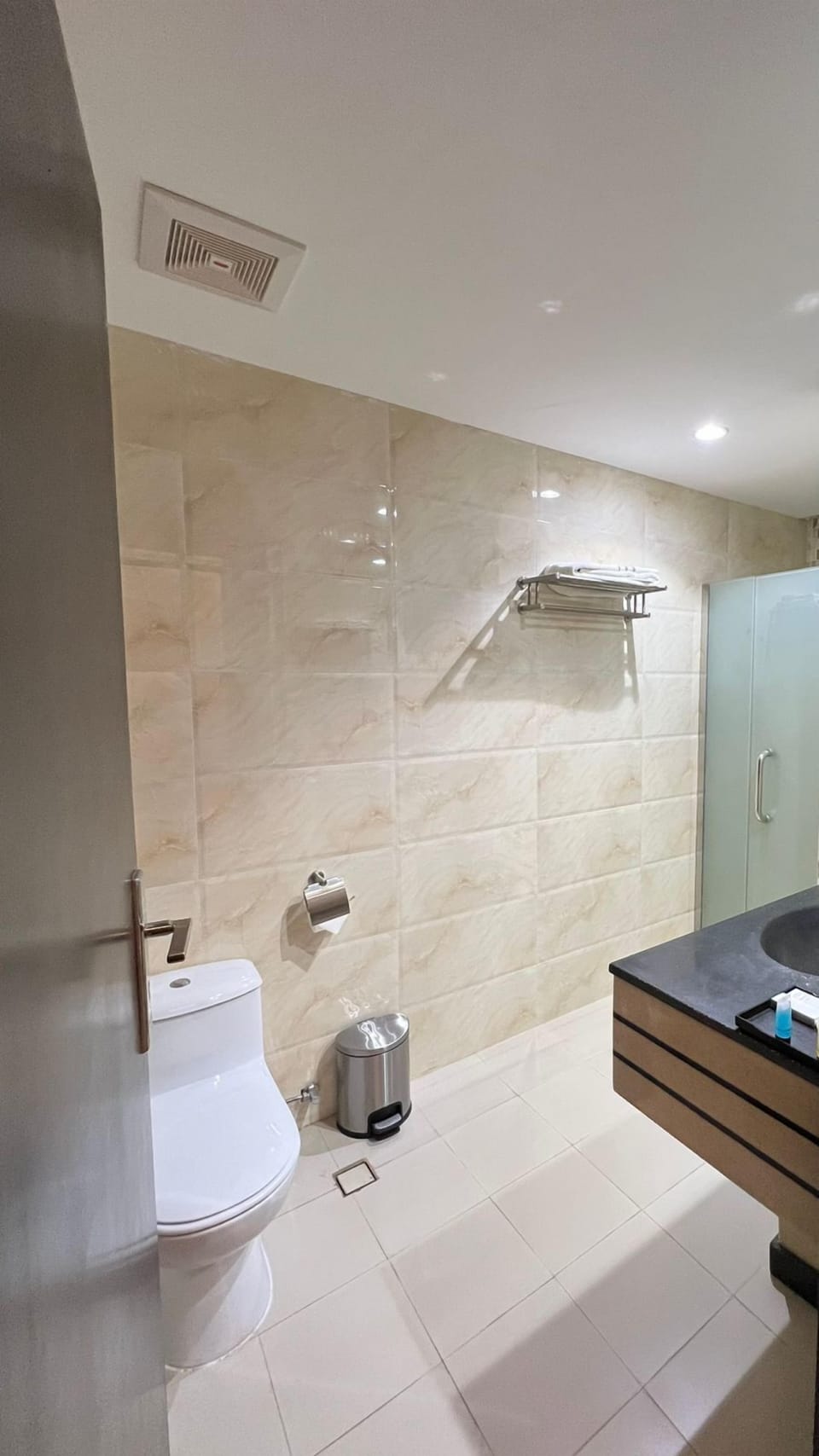 Separate tub and shower, hair dryer, bathrobes, slippers